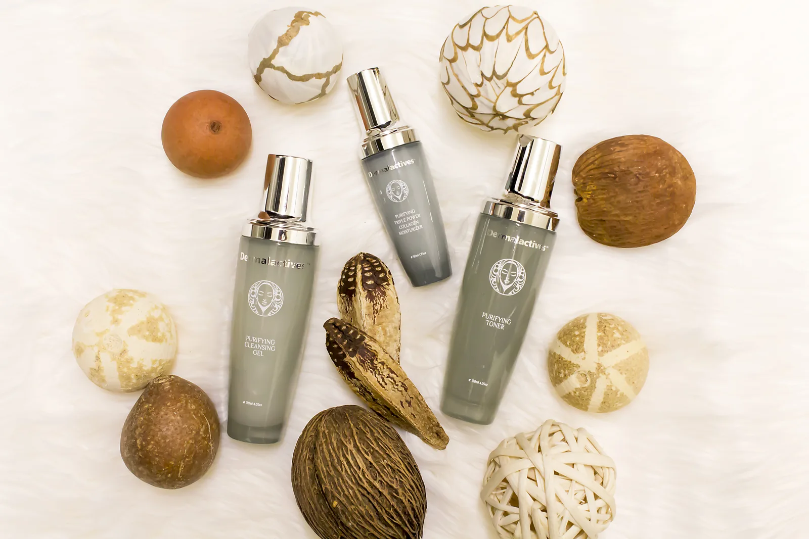 Dermalactives cleansing gel, toner and moisturizer in original product photography